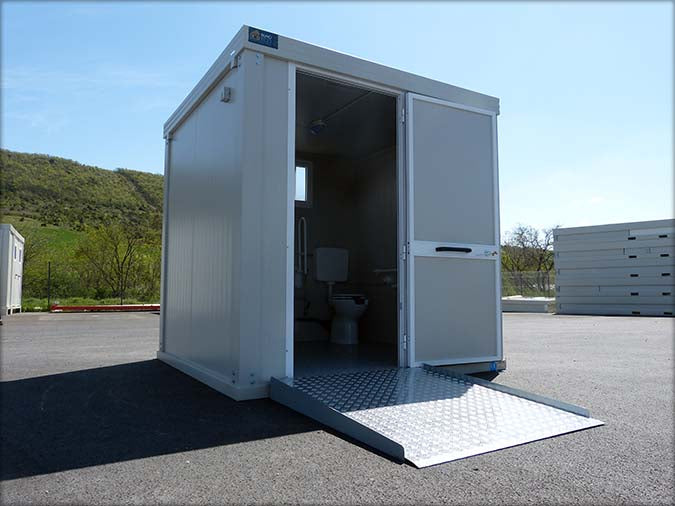 Spacious sanitary cabin with toilet and shower