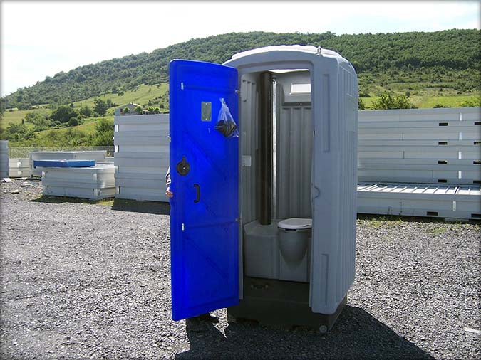 Small sanitary cabin with shower and toilet