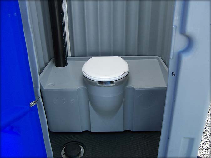 Small sanitary cabin with shower and toilet