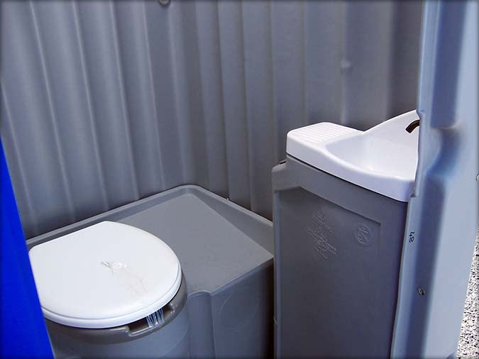 Small sanitary cabin with shower and toilet