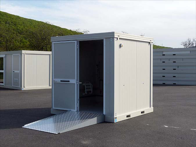 Spacious sanitary cabin with toilet and shower