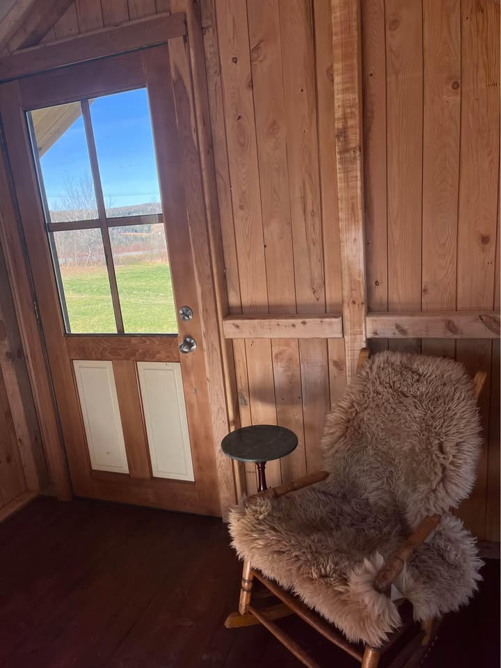 20 x 8 foot mobile home, covered in used wood, steel roof, furnished and comfortable
