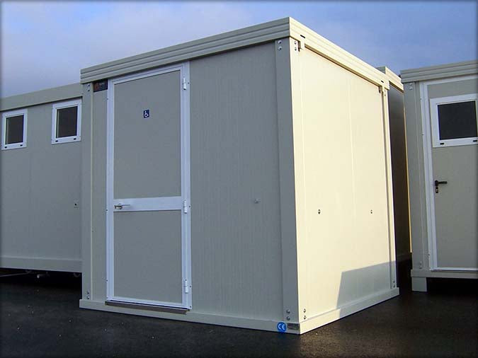 Spacious sanitary cabin with toilet and shower