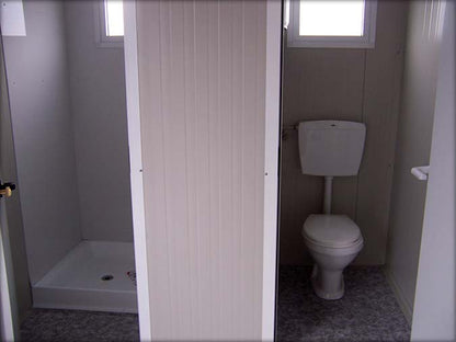 Sanitary cabin with separate toilet and independent shower